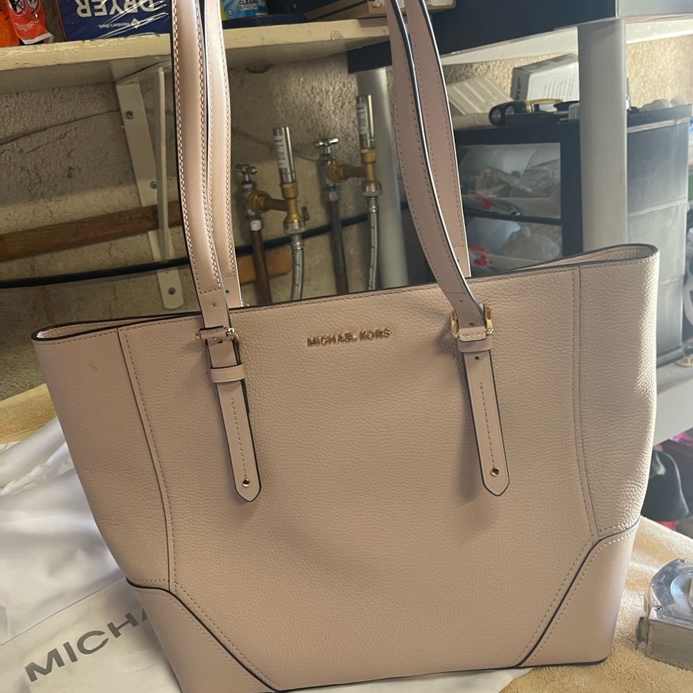 Large tote for laptop,school, professional or baby bag. Lots of space.